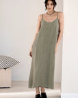 "Eadie Lifestyle Midi Linen Dress Pistachio – 100% European linen slip dress with adjustable straps and a flattering scoop neckline, perfect for effortless comfort and style.