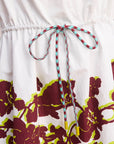 alter mini dress and open back design by Alemais close up waist tie toggle. LUXAMORE