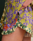 Close-up of Alemais Patty Spliced Short waistband frill edge.. LUXAMORE
