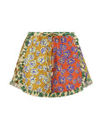 Alemais Patty Spliced Short – Studio flat lay product shot showing the exact fabric colors, contrast ruffle detail, and low-profile inseam pockets.. LUXAMORE