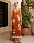 Alemais Soleil D'amour Silk Midi Dress worn by model in natural setting LUXAMORE
