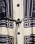 Alemais Sustainable Banderra Linen Shirtdress worn by model back angle LUXAMORE
