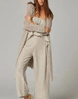 Estillo Emporio Papillion Jumpsuit - Panna White worn by model in natural setting LUXAMORE