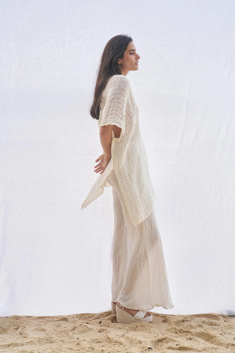 Woman Wearing Estilo Emporio Cuadra Top + Dress Cestino Panna - Dress LUXAMORE