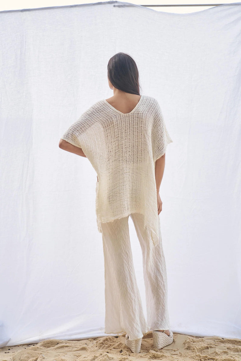 Woman Wearing Estilo Emporio Cuadra Top + Dress Cestino Panna - Dress LUXAMORE