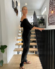 Estilo Emporio Fiorella Top - Black worn by model in natural setting LUXAMORE