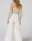 Estilo Emporio Fiorella Top - Grey - LUXAMORE -Tops-Shop the Estilo Emporio Fiorella Top in grey. Made in Positano from 100% Italian linen, this off-the-shoulder design features shirred details and fluted cuffs.