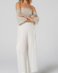 Estilo Emporio Fiorella Top - Grey - LUXAMORE -Tops-Shop the Estilo Emporio Fiorella Top in grey. Made in Positano from 100% Italian linen, this off-the-shoulder design features shirred details and fluted cuffs.