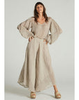 Estilo Emporio Fortune Top - LUXAMORE -Tops-Editors Notes A beautifully cut loose weave linen top, made in Positano Italy from Italian linen. This top fits true to size and is a must for any wardrobe. in a textured open weave, the Fortune Top has a boho luxe feel with an understated sleeve creating a contemporary fluid shape. Handmade in Italy the traditional way, Available now from LUXAMORE Colours available:Natural Italian linen Size is OSFA for small or extra small Style L4007