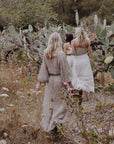 Estilo Emporio Fortune Top - LUXAMORE -Tops-Editors Notes A beautifully cut loose weave linen top, made in Positano Italy from Italian linen. This top fits true to size and is a must for any wardrobe. in a textured open weave, the Fortune Top has a boho luxe feel with an understated sleeve creating a contemporary fluid shape. Handmade in Italy the traditional way, Available now from LUXAMORE Colours available:Natural Italian linen Size is OSFA for small or extra small Style L4007