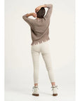 Estilo Emporio Linen Pant Stretch- Natural worn by model in natural setting LUXAMORE