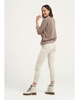 Woman Wearing Estilo Emporio Linen Stretch Pant - Natural - Pants LUXAMORE