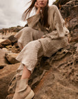 Estilo Emporio Novo Flare Pant - Brasile Natural - LUXAMORE -Pants-Estilo Emporio Novo Flare Pant in Natural 100% Italian linen made in Positano. High-waisted, flare cut. Travel in style. Shop Estilo Emporio Pants.