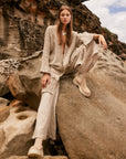 Estilo Emporio Novo Flare Pant - Brasile Natural - LUXAMORE -Pants-Estilo Emporio Novo Flare Pant in Natural 100% Italian linen made in Positano. High-waisted, flare cut. Travel in style. Shop Estilo Emporio Pants.