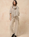 Estilo Emporio Novo Flare Pant - Brasile Natural - LUXAMORE -Pants-Estilo Emporio Novo Flare Pant in Natural 100% Italian linen made in Positano. High-waisted, flare cut. Travel in style. Shop Estilo Emporio Pants.