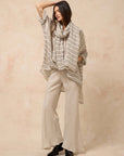 Estilo Emporio Novo Flare Pant - Brasile Natural - LUXAMORE -Pants-Estilo Emporio Novo Flare Pant in Natural 100% Italian linen made in Positano. High-waisted, flare cut. Travel in style. Shop Estilo Emporio Pants.