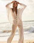 Estilo Emporio Novo Flare Pant - Brasile Panna White - LUXAMORE -Pants-Estilo Emporio Novo Flare Pant, 100% Italian linen made in Positano, Italy. High-waisted, flare cut, and eco-friendly. Shop Estilo Emporio Pants at Luxamore.
