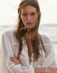 Estilo Emporio Oboe Linen Shirt - LUXAMORE -Top-Estilo Emporio Oboe Shirt 100% Linen, made in Positano. Collarless neckline with front buttons, emphasizing the decolletage. Billowing blouse with a curved hem.