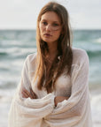 Estilo Emporio Oboe Linen Shirt - LUXAMORE -Top-Estilo Emporio Oboe Shirt 100% Linen, made in Positano. Collarless neckline with front buttons, emphasizing the decolletage. Billowing blouse with a curved hem.