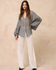 Estilo Emporio Oboe Linen Shirt - LUXAMORE -Top-Estilo Emporio Oboe Shirt 100% Linen, made in Positano. Collarless neckline with front buttons, emphasizing the decolletage. Billowing blouse with a curved hem.