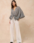 Estilo Emporio Oboe Linen Shirt - LUXAMORE -Top-Estilo Emporio Oboe Shirt 100% Linen, made in Positano. Collarless neckline with front buttons, emphasizing the decolletage. Billowing blouse with a curved hem.