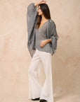 Estilo Emporio Oboe Linen Shirt - LUXAMORE -Top-Estilo Emporio Oboe Shirt 100% Linen, made in Positano. Collarless neckline with front buttons, emphasizing the decolletage. Billowing blouse with a curved hem.