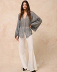 Estilo Emporio Oboe Linen Shirt - LUXAMORE -Top-Estilo Emporio Oboe Shirt 100% Linen, made in Positano. Collarless neckline with front buttons, emphasizing the decolletage. Billowing blouse with a curved hem.