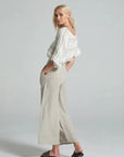 Estilo Emporio Linen Pant Riviera worn by model in natural setting LUXAMORE