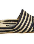 Estilo Emporio Shoes Woven Jute Slide worn by model in natural setting LUXAMORE