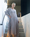 Exclusive: Estilo Emporio Polla Maxi Kaftan - Bolegna worn by model in natural setting LUXAMORE