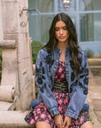 Floral Cosmos Denim Boho Embroidered Overshirt worn by model in natural setting LUXAMORE