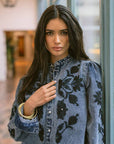 Floral Cosmos Denim Boho Embroidered Overshirt worn by model in natural setting LUXAMORE