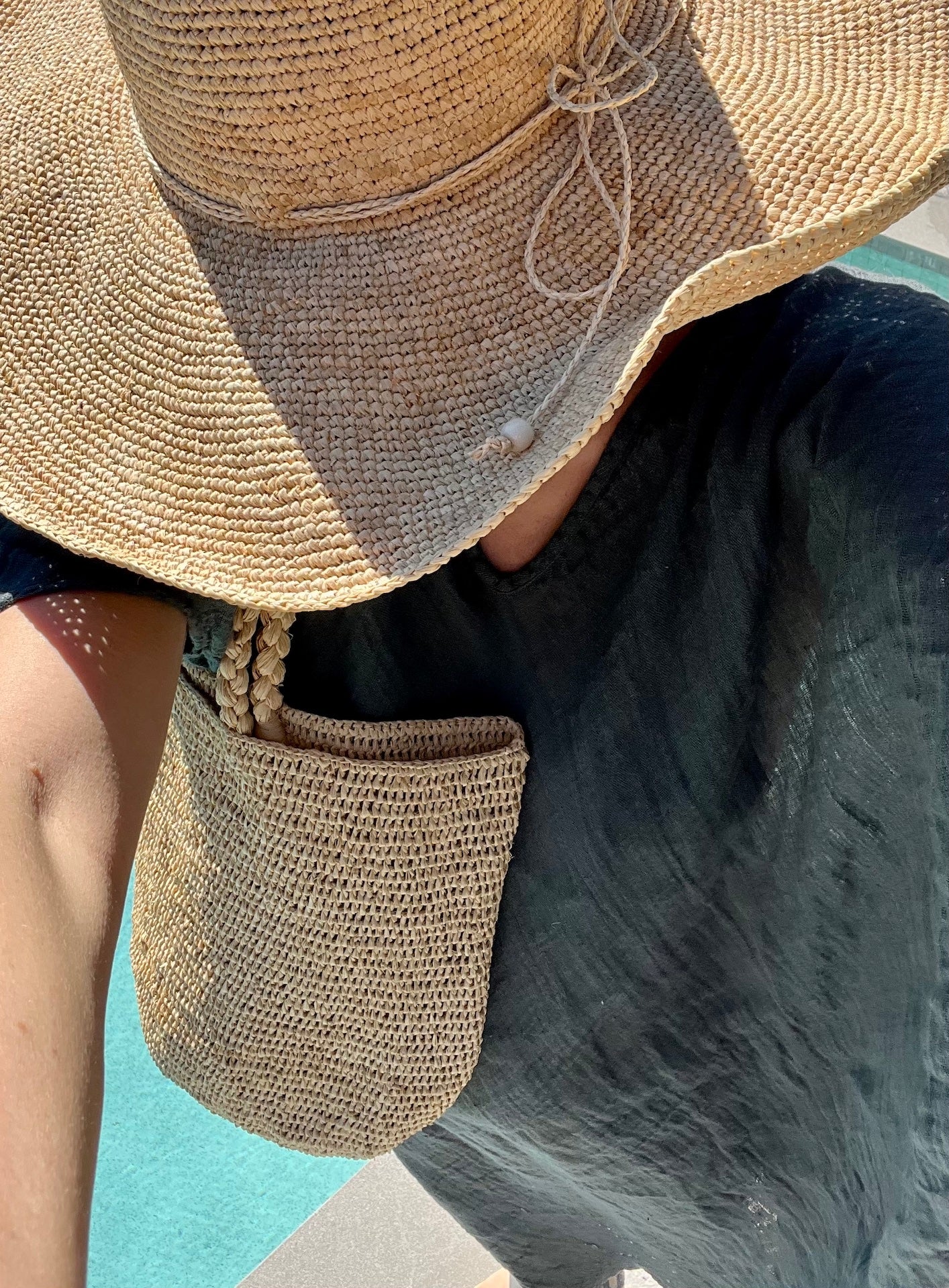 Woman Wearing Made in Mada Hat AZIZ - hat LUXAMORE