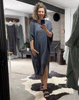 Woman taking selfie of La Bottega di Brunella Linen Dress VESTITO FAUSTA - Campagna Luxor LUXAMORE