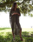 La Bottega di Brunella Linen Dress Vestito Fausta Garzata - Fossil worn by model in natural setting LUXAMORE
