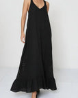 Linen Dress Black Maxi Lace Back Made in Italy worn by model in natural setting LUXAMORE