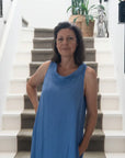Linen Dress Made in Italy: Sleeveless Boat Neck Maxi Blue worn by model in natural setting LUXAMORE