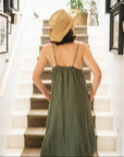 Linen Slip Dress Midi Made in Italy Khaki worn by model in natural setting LUXAMORE
