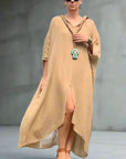Linen Dress Oversize Maxi Kaftan Made in Italy Caramel worn by model in natural setting LUXAMORE