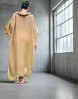 Linen Dress Oversize Maxi Kaftan Made in Italy Caramel worn by model in natural setting LUXAMORE