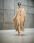 Linen Dress Oversize Maxi Kaftan Made in Italy Caramel worn by model in natural setting LUXAMORE