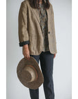 Made in Mada Hat Gaston worn by model in natural setting LUXAMORE