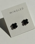 Woman Wearing Mingled Black Cross Stud Earrings - Small Cross Earrings, Minimalist - Earings LUXAMORE