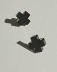 Woman Wearing Mingled Black Cross Stud Earrings - Small Cross Earrings, Minimalist - Earings LUXAMORE