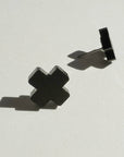 Woman Wearing Mingled Black Cross Stud Earrings - Small Cross Earrings, Minimalist - Earings LUXAMORE