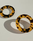 Woman Wearing Mingled Hoop Stud Earrings - Honey Tortoise Shell - Earrings LUXAMORE