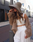 Mode & Affaire Cascade Fur Jacket In Ink - LUXAMORE -JACKET-Mode & Affaire Cascade Fur Jacket The Mode & Affaire Cascade Rabbit Fur Jacket is a sustainable and ethically crafted winter staple Shop Mode & Affaire Fur