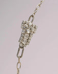 Orna Curio Vintage Bespoke Pearl and Diwali Flower Necklace - LUXAMORE -necklace-One of a Kind – Hand-crafted Necklace This elegant necklace features a vintage diamante crystal element, complemented by a sterling silver chain and fittings, with a vintage gold-plated garnet Indian floral centrepiece. This one of one necklace was handcrafted in Perth, WA. Measurements: 61cm Adjustable Materials: Sterling Silver 925 Chain and Hardware, Freshwater Pearls, Vintage Indian garnet and crystal Centrepiece.