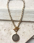 Pre Order Coin necklace boutique jewelry crystal handmade mixed metal worn by model in natural setting LUXAMORE