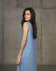 Linen Dress Made in Italy: Sleeveless Boat Neck Maxi Blue worn by model in natural setting LUXAMORE